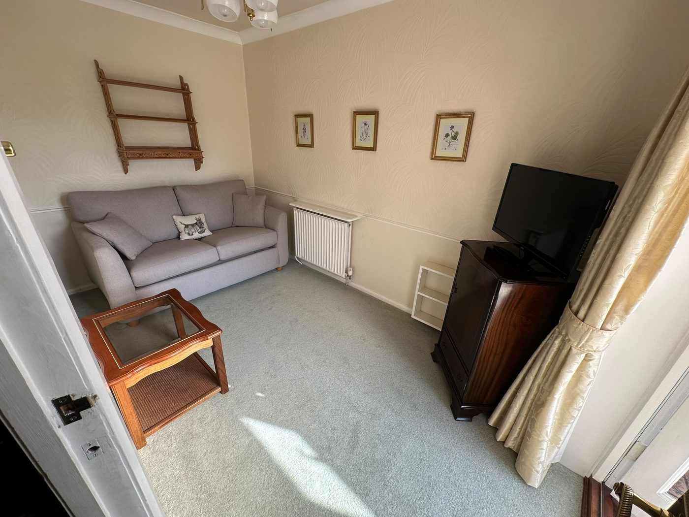 Sitting room before house clearance in Tadcaster
