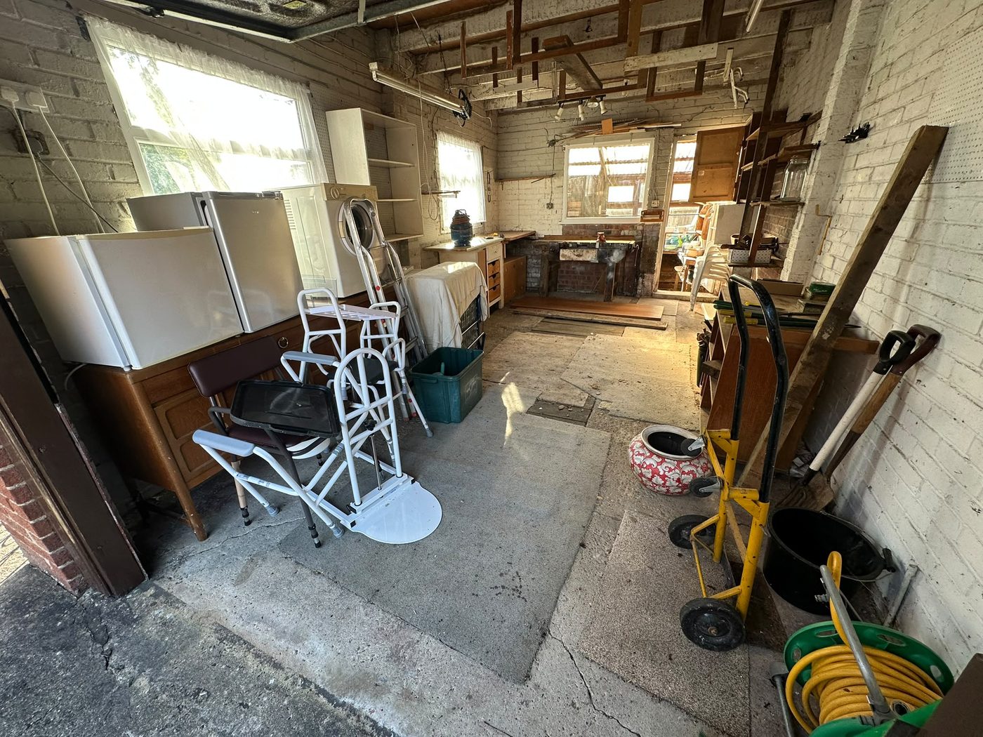 Garage before clearance in Tadcaster with stored items