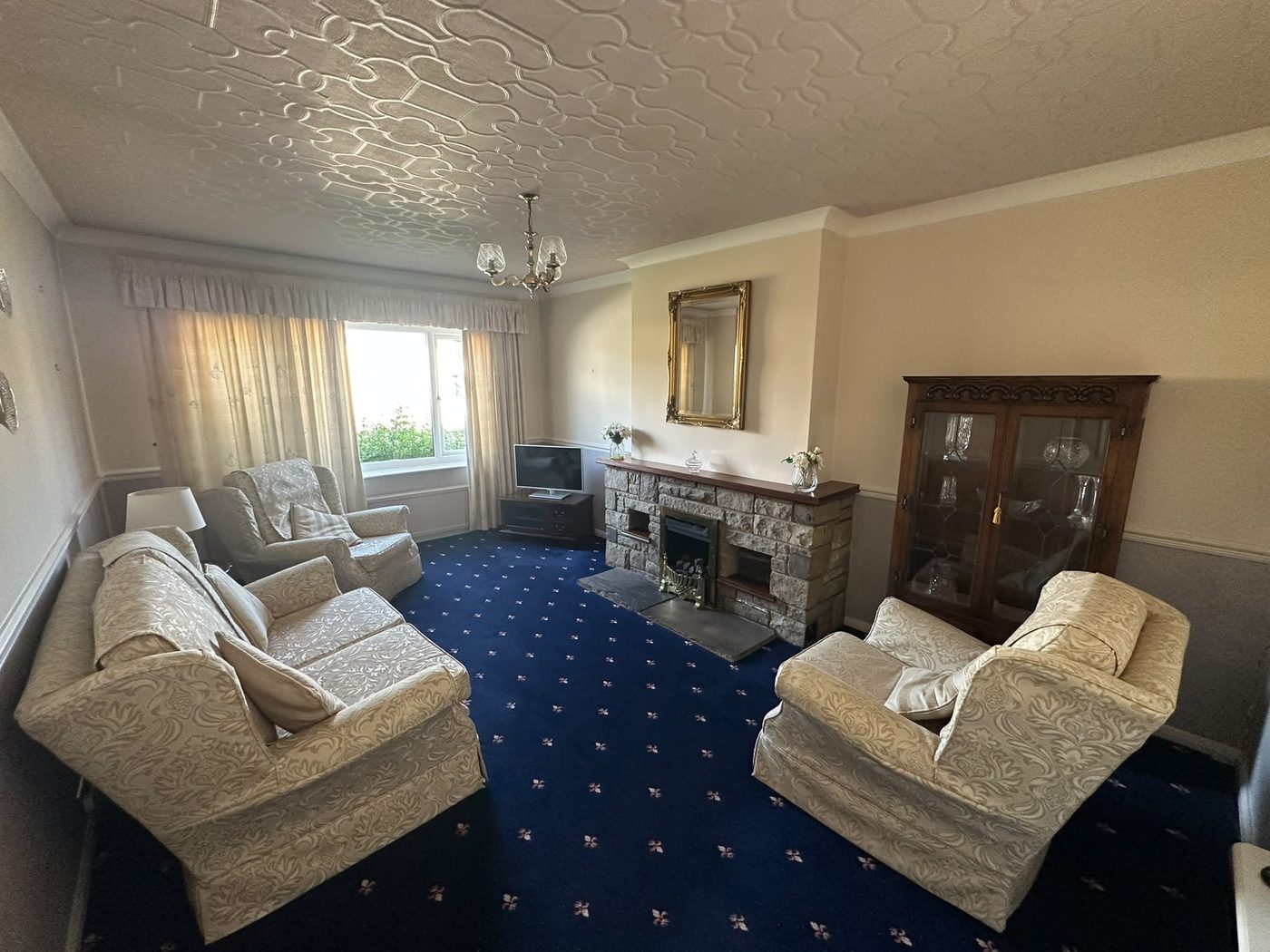 Main living room before house clearance in Tadcaster